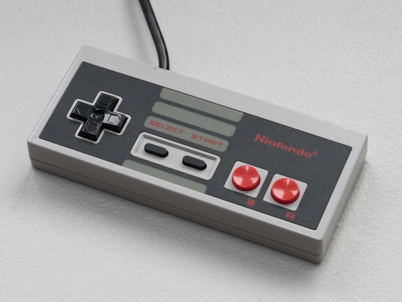 Close-up of a Nintendo Entertainment System controller on a surface
